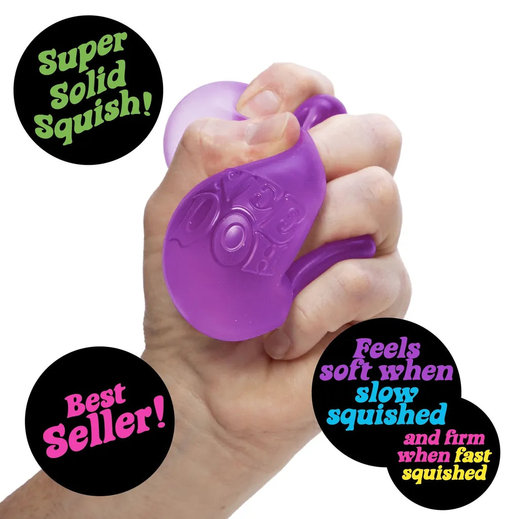 Hand squeezing purple NEE DOH Super Solid Squish stress toy with 'Best Seller' and texture claim badges