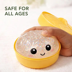 Safe for all ages glitter dumpling squishy toy in yellow steamer basket, non-toxic and skin-friendly